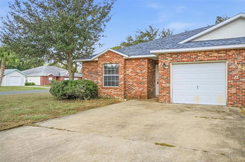 Photo of 166 Plain View Drive #A, Palm Coast, FL 32164 (MLS # FC316042)