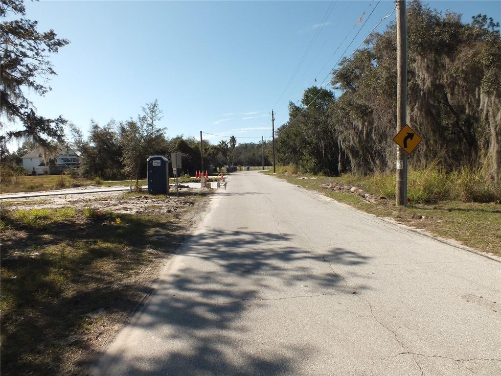 Photo of 100 Brigham Road NW, Winter Haven, FL 33881 (MLS # P4933470)