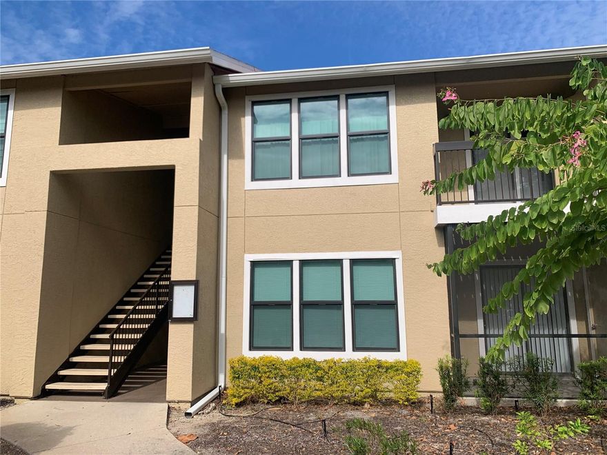 Two bedroom ground floor condo with screened lanai overlooking tennis courts. Updates include matching quartz countertops, walk-in shower in the primary bedroom. Storage room off lanai. 
Vintage Grand community offers two pools, spa , tennis courts, fitness center and clubhouse. View of bird sanctuary from kitchen window. Walking distance to Costco and Publix. The building has updated stucco, the roof was replaced and strengthened in 2024 for category 3 hurricane and new impact windows were replaced in 2022.