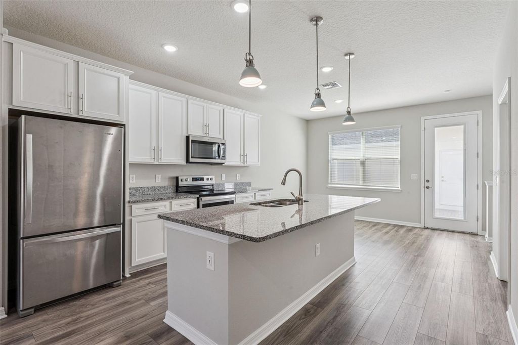 Photo of 1318 Painted Bunting Avenue, Oakland, FL 34787 (MLS # O6389319)