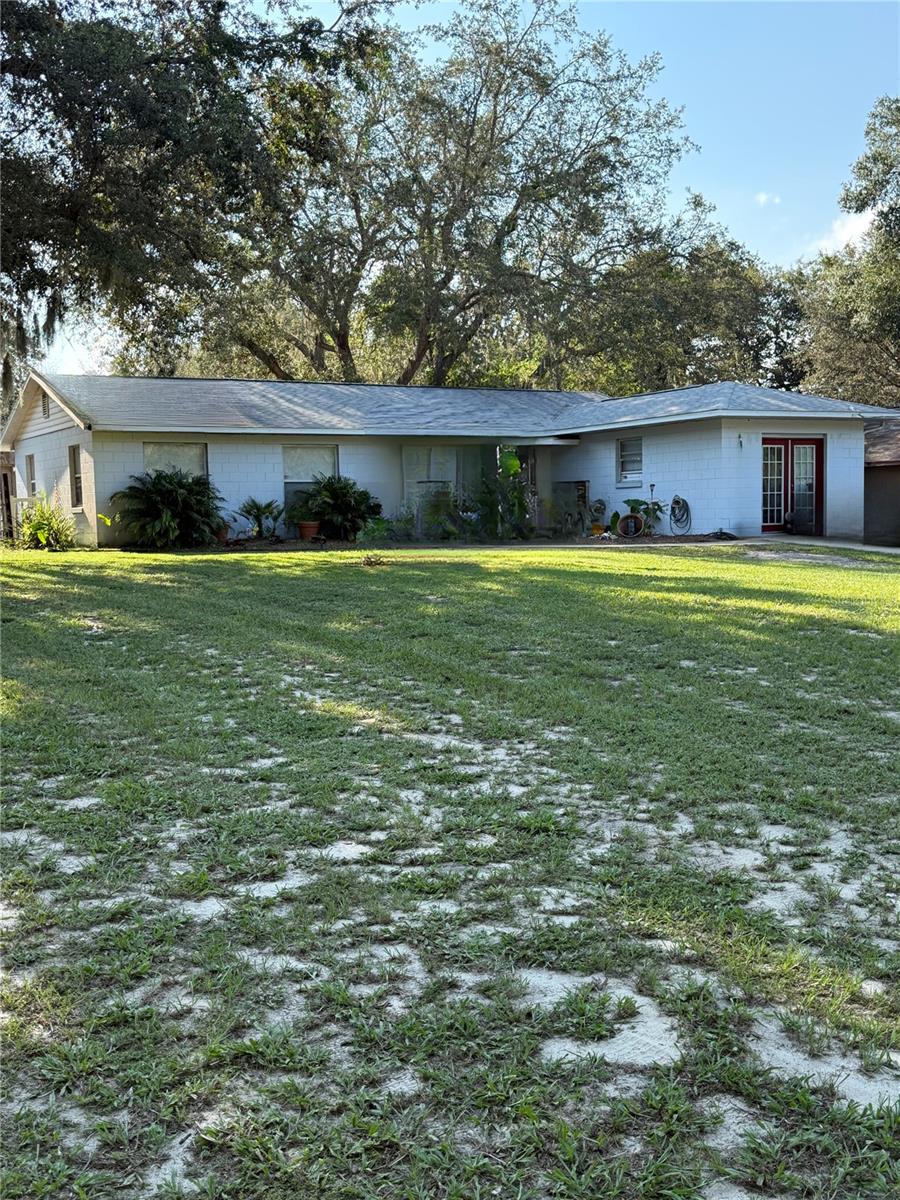 Welcome to this 4 Bed/2 Bath home located near Lake Griffin. This property offers immense potential for renovation for renovation enthusiasts or the savvy investor Roof 2019, Newer AC. Despite needing a little TLC, its prime location is just minutes away from shopping, dining and entertainment. Whether you're a handy individual or an investor, seize the opportunity to transform this diamond in the rough into a gem in the heart of Lady Lake.