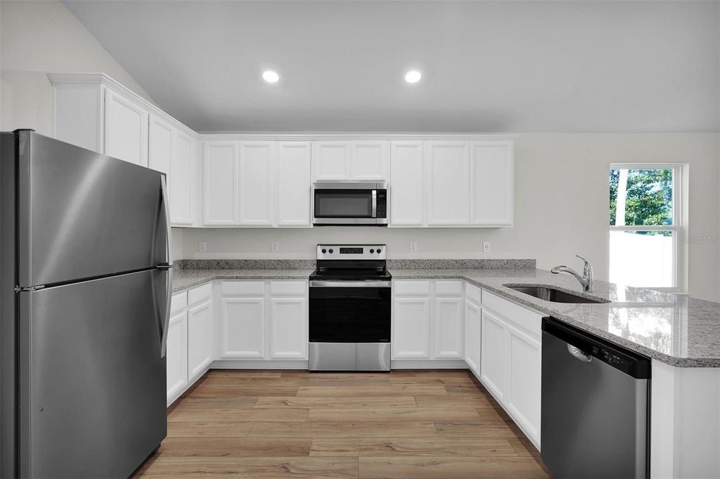 Photo of 2438 SW 170th Loop, Ocala, FL 34473 (MLS # TB8562900)