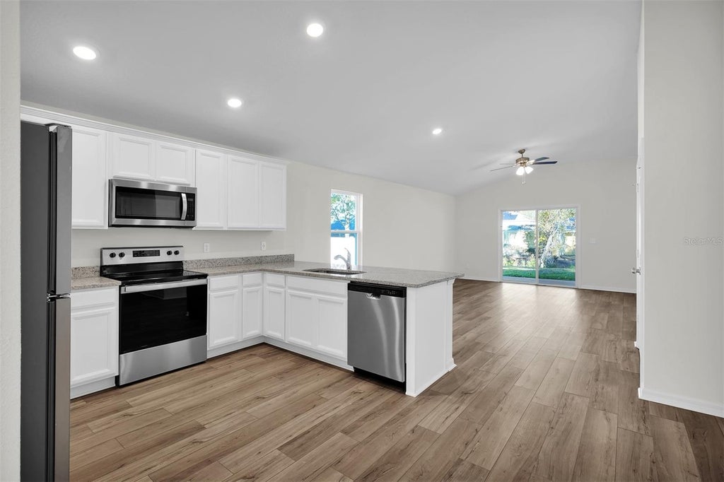 Photo of 2438 SW 170th Loop, Ocala, FL 34473 (MLS # TB8562900)
