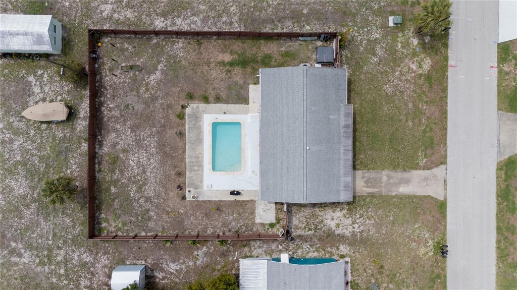 Photo of 821 Silver Springs Terrace NW, Port Charlotte, FL 33948 (MLS # A4686264)