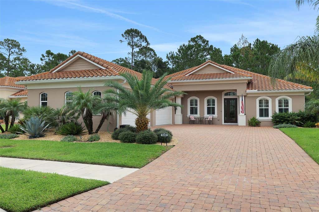 Photo of 142 Portofino Blvd, New Smyrna Beach, FL 32168 (MLS # V4950638)