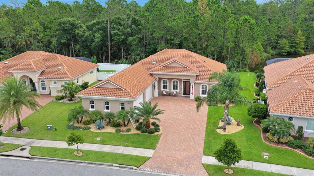 Photo of 142 Portofino Blvd, New Smyrna Beach, FL 32168 (MLS # V4950638)
