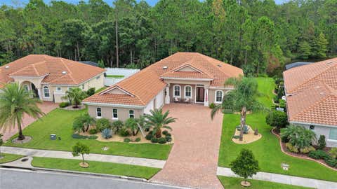 Photo of 142 Portofino Blvd, New Smyrna Beach, FL 32168 (MLS # V4950638)