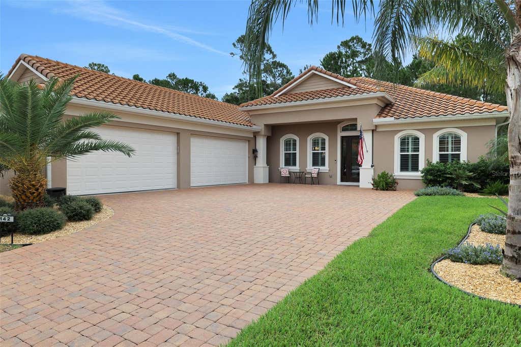 Photo of 142 Portofino Blvd, New Smyrna Beach, FL 32168 (MLS # V4950638)