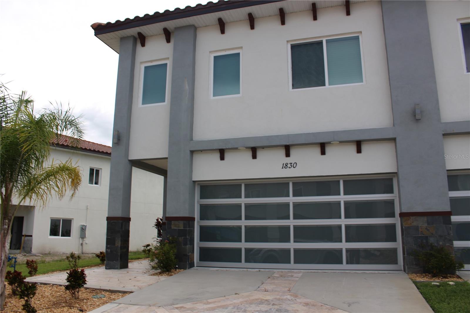 Providence Gated Townhome. Modern 3BR/2.5BA with gourmet kitchen, quartz island, wine fridge & stainless appliances. Luxurious primary suite with balcony & spa bath. Serene pond views, high ceilings, crown molding & contemporary finishes. Resort-style community with pools, fitness, tennis, pickleball & championship golf course. Call today to schedule your private showing!