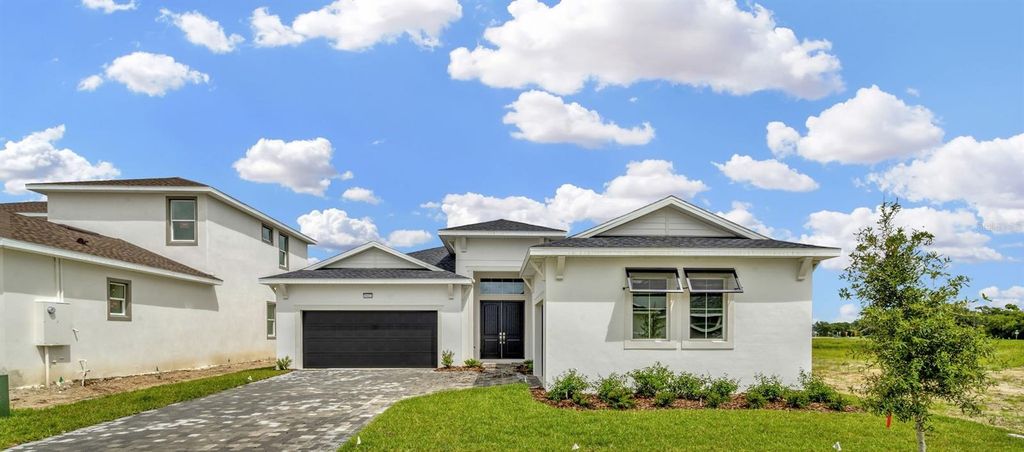 Photo of 10432 Torchwood Sea Way, San Antonio, FL 33576 (MLS # TB8351410)