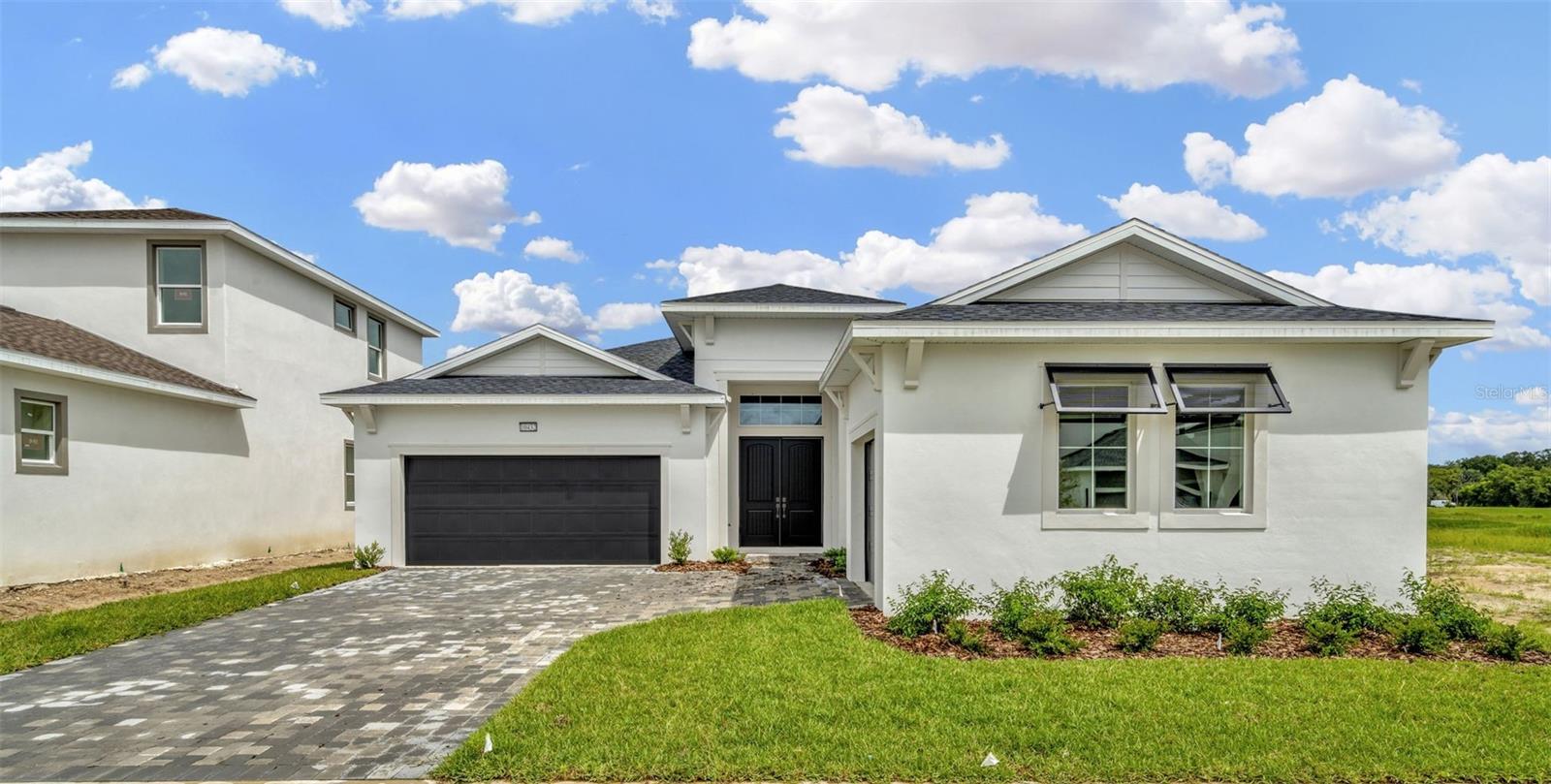 Contemporary NEW CONSTRUCTION lagoon living awaits in Mirada! Discover the epitome of elegance in this stunning residence, located in the Mirada community. Boasting 3 bedrooms and 3 bathrooms, this home is designed for both comfort and sophistication. At the heart of this exquisite abode is a gourmet kitchen that will delight culinary enthusiasts and entertainers alike. Outfitted with top-of-the-line appliances and adorned with premium finishes, it’s the ideal space for creating unforgettable dining experiences. Residents of this exceptional property enjoy exclusive access to Mirada's crown jewel—a picturesque 15-acre lagoon, a tranquil oasis that invites relaxation amidst breathtaking natural beauty. For those who appreciate an active lifestyle, the community offers a wealth of amenities. Explore scenic walking and nature trails that wind through lush landscapes, perfect for exercise, birdwatching, or simply savoring the serene environment. Families and pet owners will love the dedicated playgrounds and dog parks, providing ample space for recreation and cherished moments. This home in the Mirada community transcends traditional living, offering a refined lifestyle where every detail is meticulously crafted for the discerning resident. Experience unparalleled luxury and tranquility in your new sanctuary!