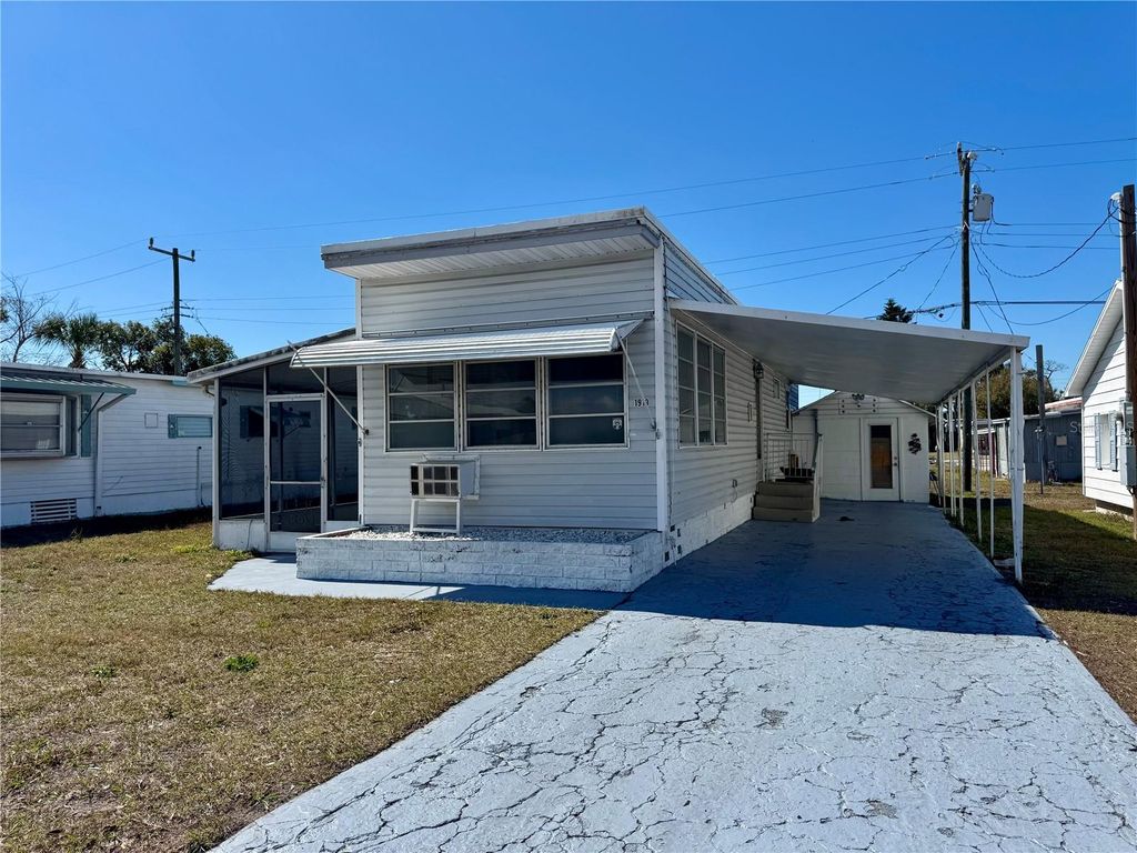 Photo of 1919 Pleasure Drive, Holiday, FL 34691 (MLS # TB8477158)