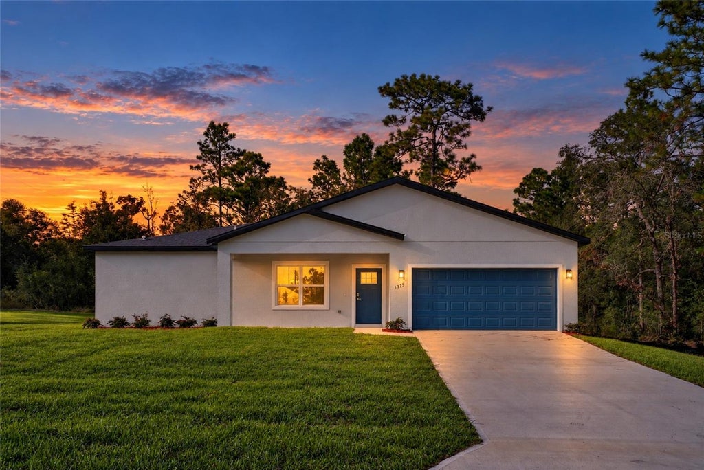 Photo of 1325 W Evergreen Drive, Citrus Springs, FL 34434 (MLS # O6452771)