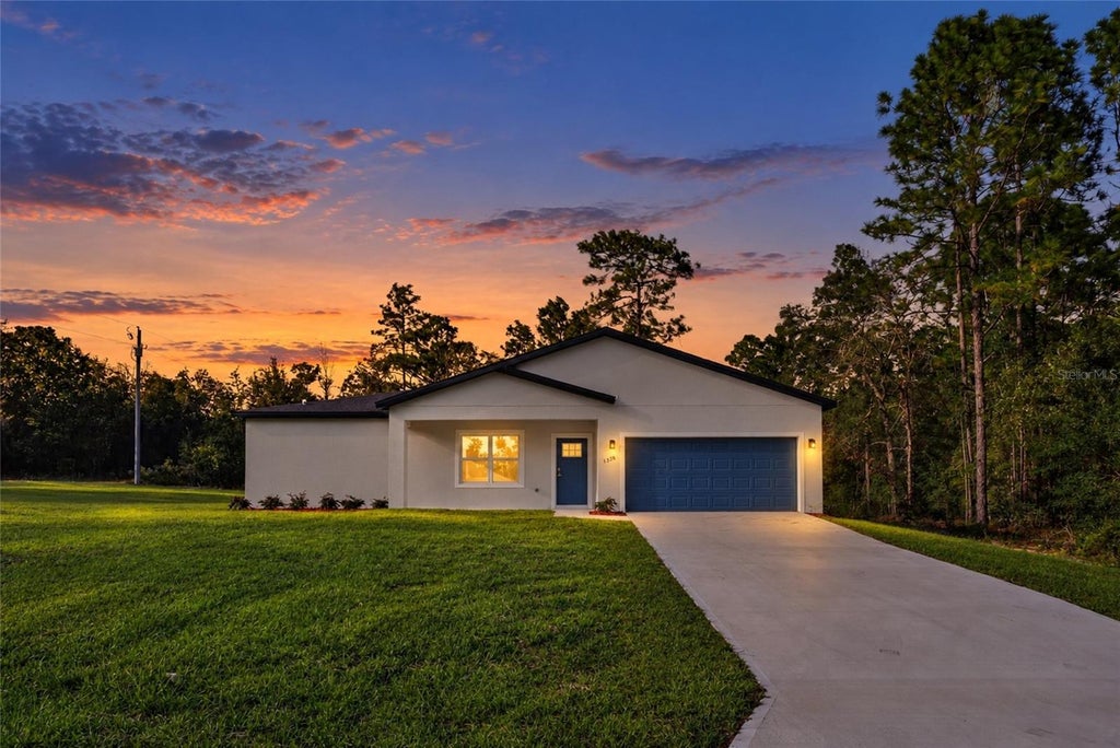 Photo of 1325 W Evergreen Drive, Citrus Springs, FL 34434 (MLS # O6452771)