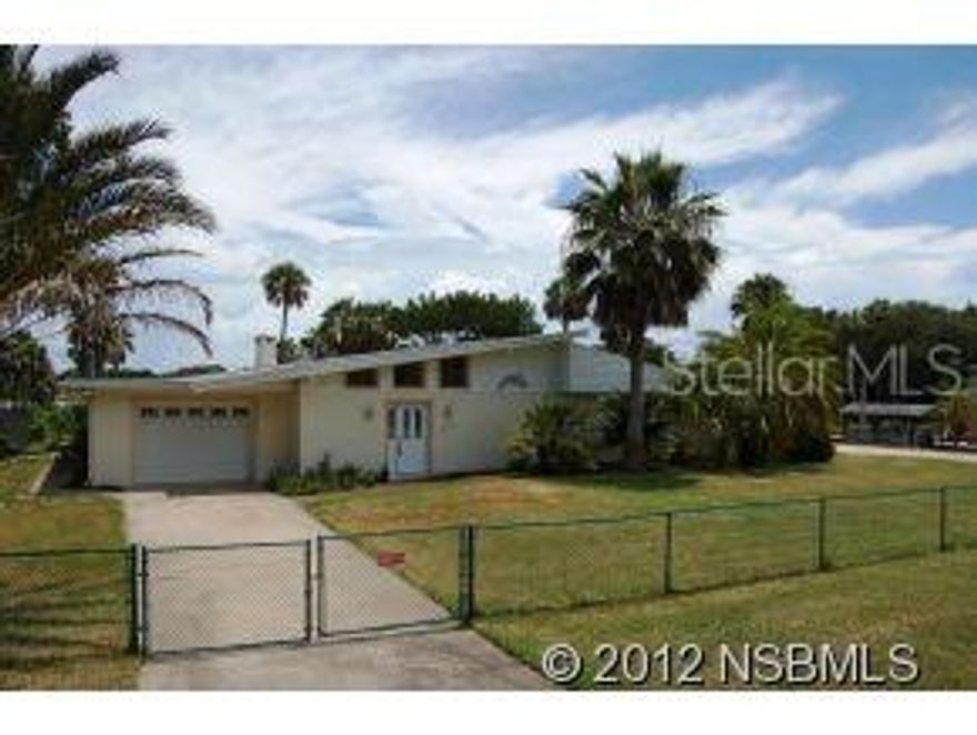 This riverfront Edgewater property is a water-lovers dream! 3 bed, 2.5 bath, and over 4000sq is good but LOCATION is better! 1.09 ac with water on 2 sides; 140 ft of river frontage and 180 ft of frontage on your own private canal with a seawall! Boat dock extends out directly into the ICW, and frame boat house just needs a cover. This area of the river is rife with beautiful wildlife. Youre sure to see plenty of dolphin, manatee & heron from your backyard, and enjoy fishing off your extended boat dock. If that isnt enticing enough, you will also have a place for your land toys; 2 large parking slabs to accommodate an RV, ATV or more watercraft. Property this unique and gorgeous doesnt come along often, so come take a look! ;Water: City