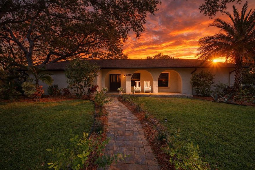 One or more photo(s) has been virtually staged. Welcome Home to your private Florida retreat in the highly sought-after community of Brookside. This stunning 4-bedroom, 2-bath pool home has been completely remodeled with upscale finishes and thoughtful design, offering a perfect blend of elegance, comfort, and resort-style living.

At the heart of the home, the chef’s kitchen impresses with newer appliances, exquisite quartz countertops, a large center island, custom soft-close cabinetry, and a built-in pantry—ideal for both everyday living and entertaining in style.

The luxurious primary suite serves as a serene escape, featuring a spacious walk-in closet and a beautifully appointed en-suite bath with quartz counters, dual vanities, classic subway tile, and a sleek glass-enclosed shower. Private access to the pool area creates a true indoor-outdoor living experience.

Step outside to your own backyard oasis—an expansive screened lanai showcasing a sparkling saltwater pool with heater, recently resurfaced and enhanced with updated equipment. The hot tub (2021) conveys, offering the perfect place to unwind under breathtaking sunset skies. A new irrigation system, a firepit and a fully fenced yard with a spacious workshop shed complete this incredible outdoor space.

Inside, the home continues to impress with a desirable split floor plan, generous living areas, a formal living and dining room as well as a family room that is open to the kitchen, fresh interior paint, and an abundance of natural light throughout.

Significant upgrades provide peace of mind, including a 2021 roof, brand new hurricane-impact windows and doors (2025), newer appliances throughout, and a well-maintained A/C system (2015). This home has had NO hurricane damage and does NOT require flood insurance.

This move-in-ready residence offers the ultimate Florida lifestyle—luxury, privacy, and exceptional indoor-outdoor living. A rare opportunity you won’t want to miss.