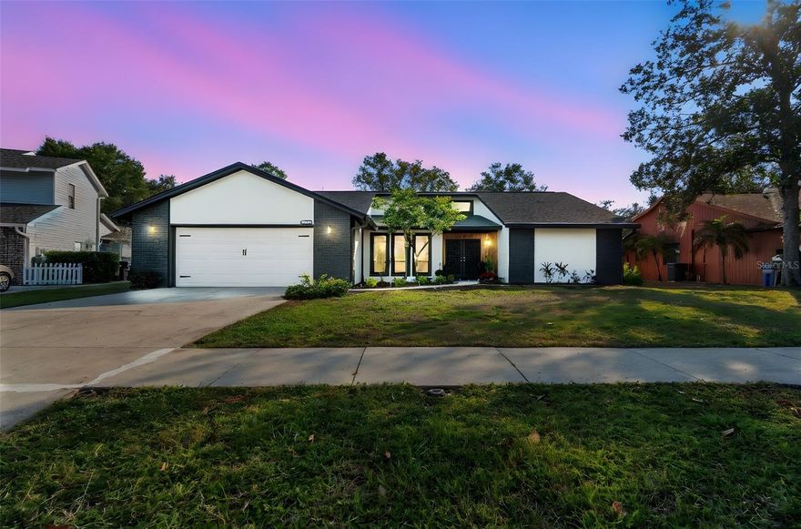 Welcome to your beautifully updated home in the sought-after Bloomingdale community of Valrico! One or more photos are virtual staged. This home has been thoughtfully remodeled, giving you a fresh, modern living space in one of the most convenient and well-loved neighborhoods in the area. When you walk in, the first thing you notice is the open feel created by the high ceilings, the natural light pouring in through the skylights, and the clean look of the luxury vinyl plank flooring. The living room features a door that opens fully to a spacious, fully tiled patio, seamlessly blending indoor and outdoor living and creating an airy, expansive feel. The layout includes a bonus room that works perfectly as an office, an extra bedroom, or whatever you need it to be. The kitchen has been updated with new cabinets, quartz countertops and new LG stainless steel appliances including french door refrigerator, range, microwave and dishwasher. It feels bright, clean, and ready for everyday cooking or hosting friends and family. With a desirable split floor plan the master suite is separate from all of the other bedrooms. This suite is truly special. It has its own walk-in closet and a stunning bathroom that immediately stands out. The design, the finishes, and the overall feel make it a relaxing space you will look forward to using every day. Key updates include a new roof completed in 2025, modern appliances, and a new garage door opener, along with an automatic sprinkler system for added convenience. The location is another big highlight. You are close to top-rated schools, the Bloomingdale Golfers Club, Lithia Springs, the YMCA, local tennis courts, and all the shopping and dining in Brandon and Tampa. A brand-new Whole Foods is also opening nearby, adding even more convenience to the area. With optional HOA dues, you get the benefits of the neighborhood without added pressure or restrictions. This home combines a modern, updated interior with the comfort and charm of an established community. Schedule your private showing and come see for yourself what makes it such a great place to live.