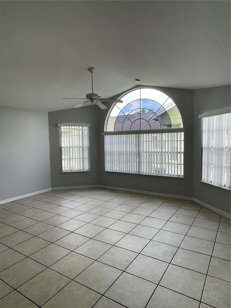 Photo of 3142 Britannia Boulevard #D, Kissimmee, FL 34747 (MLS # O6416105)