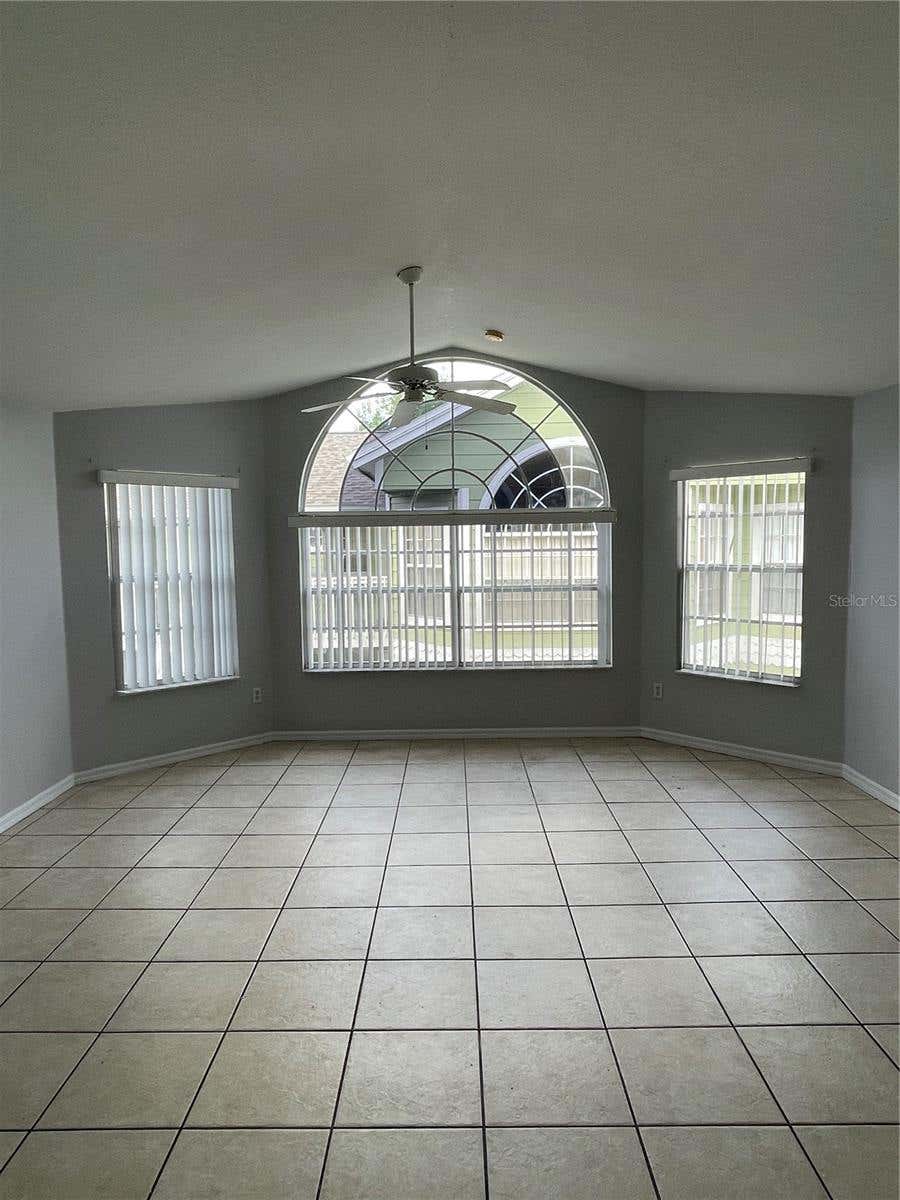 Photo of 3142 Britannia Boulevard #D, Kissimmee, FL 34747 (MLS # O6416105)