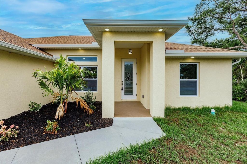 Photo of 820 Bowman Terrace, Port Charlotte, FL 33953 (MLS # C7519130)