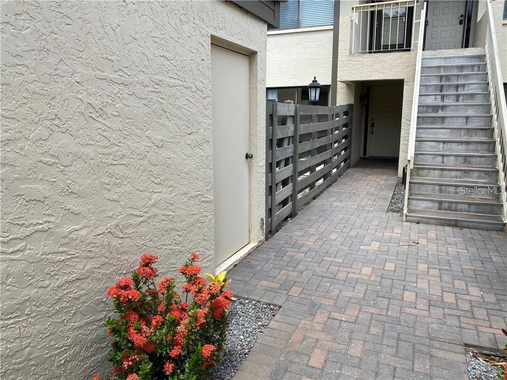 Peaceful 2BR/2BA Condo with Private Garage & Oversized Lanai – Countryside
Welcome to your quiet retreat in the heart of Countryside. This move-in ready, second-floor condo offers peaceful living in a serene community, complete with a rare private one-car garage and a screened lanai stretching the full length of the home—perfect for enjoying evening breezes and Florida sunsets.
Inside, you’ll find a bright, open layout with vaulted ceilings, fresh neutral paint, and laminate flooring throughout. The spacious family room features a cozy stone wood-burning fireplace and a stylish wet bar, creating a warm and inviting atmosphere. A wall of glass doors fills the space with natural light and opens to the tranquil lanai.
The chef’s kitchen offers Cinnamon Spiced cabinetry, granite countertops, a full appliance package, and a charming breakfast nook surrounded by sunlight.
The private master suite is tucked away at the back with an en-suite bath and walk-in closet, while the guest bedroom and bath are conveniently located near the front of the home. A laundry area is also included.
This well-cared-for community is known for its quiet surroundings and friendly neighbors, offering a sparkling pool and cabana, private tennis courts, beautifully landscaped grounds, and peaceful walking paths.
Nestled between two golf courses and close to everything—shopping, dining, parks, Mease Hospital, and just a short drive to Florida’s famous beaches—you’ll enjoy both tranquility at home and convenience nearby.
A peaceful condo in desirable Countryside, ready for you to move in and relax.