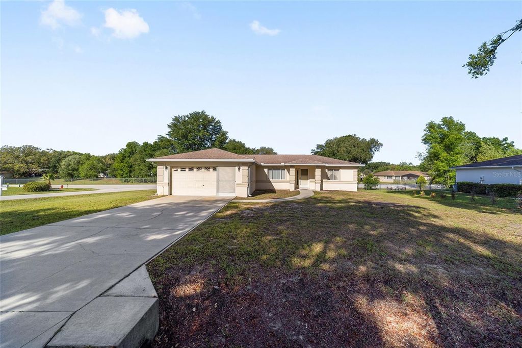Photo of 10470 SW 61st Terrace Road, Ocala, FL 34476 (MLS # OM722370)