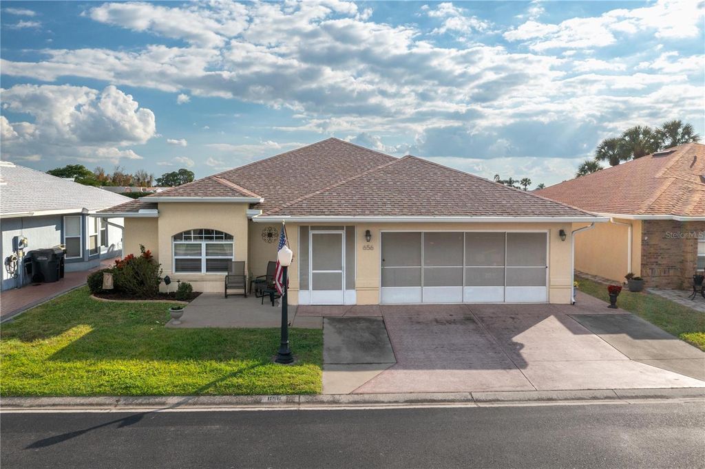 Photo of 656 Sweetwater Way, Haines City, FL 33844 (MLS # P4937438)