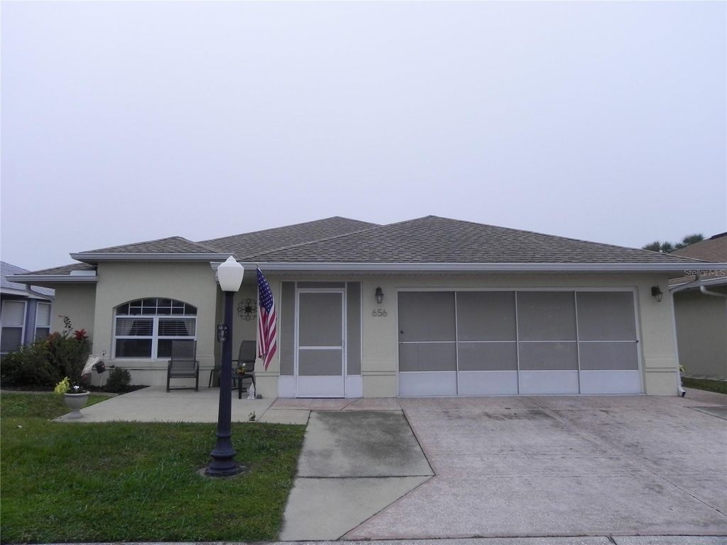 Photo of 656 Sweetwater Way, Haines City, FL 33844 (MLS # P4937438)