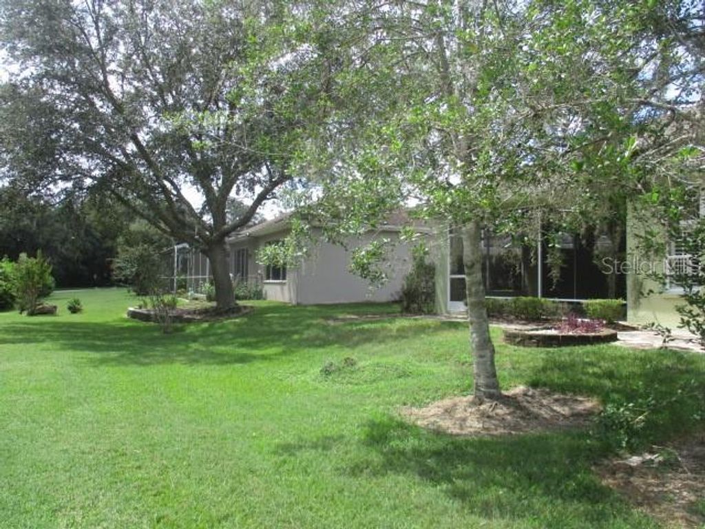 Photo of 4380 Caliquen Dr, Brooksville, FL 34604 (MLS # TB8427413)