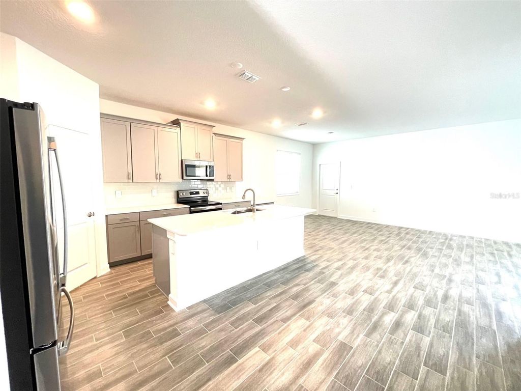 Photo of 11432 Rhyme Avenue, Orlando, FL 32832 (MLS # O6402879)