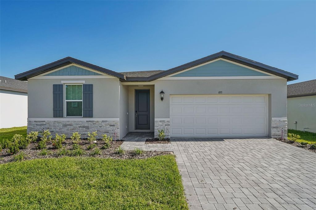Photo of 851 Sunshower Drive, Haines City, FL 33844 (MLS # O6348090)