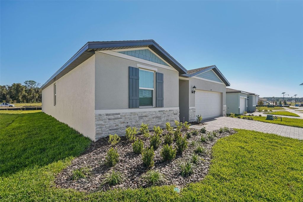 Photo of 851 Sunshower Drive, Haines City, FL 33844 (MLS # O6348090)