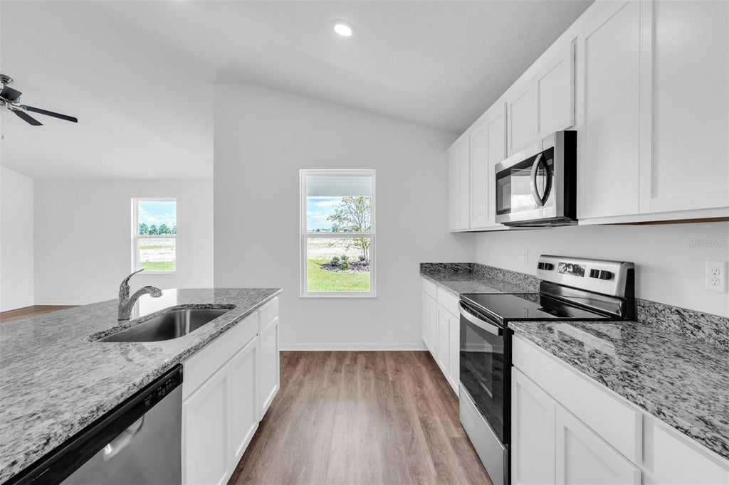 Photo of 13392 SW 77th Avenue, Ocala, FL 34473 (MLS # TB8562913)