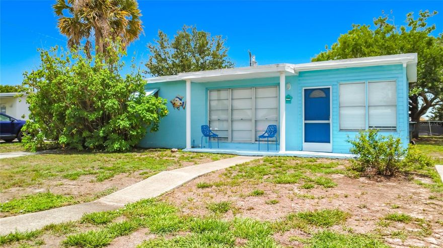 This home is turnkey and fully furnished with everything that you need, including a fully stocked kitchen, tv's, linens, and supplies. Ready to move in. There are no lease restrictions, so you can use as a vacation home, seasonal rental, short term rental, rental or primary home. No HOA and no CDD fee. 2 bedrooms, 1 bath, extra parking, new custom-made window coverings, large outdoor open patio, and open layout. Enjoy the hammock in the backyard under the big oak tree. The kitchen has stainless steel appliances and newer white cabinets. The washer and dryer (2022) are in the utility room next to the back patio. The entire home has waterproof laminate flooring. AC is 2019. This home is located just 1.1 miles from Warm Mineral Springs Park and a short drive to CoolToday Park. This home was listed on Airbnb, and rental statements are available, upon request. Call today to schedule a private showing. The agent is also the owner.