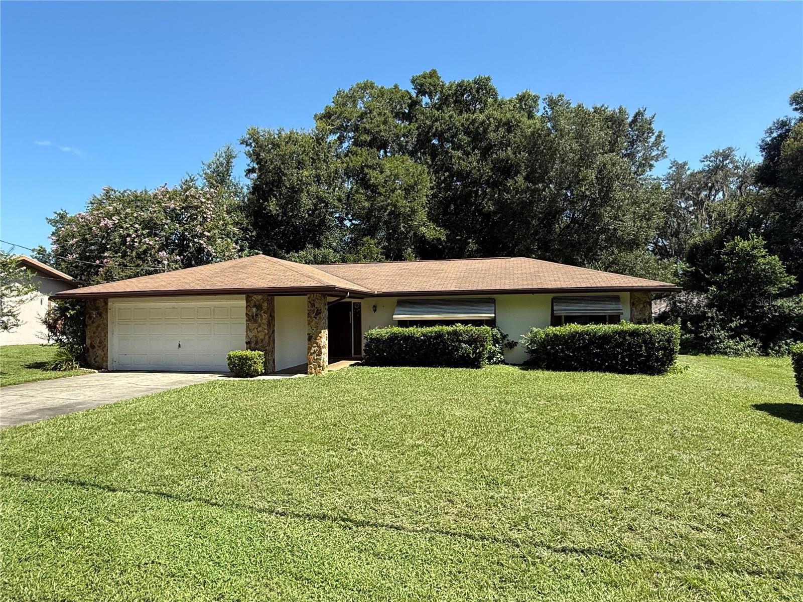 WOW! 1500 sqft BLOCK Home under 200k!!! NO HOA! Inverness Highlands North with 2 Large Bedrooms, 2 Full Baths, Updated Kitchen, and two Large living spaces! Nice 20 inch ceramic tile flooring in all wet areas, kitchen, dining room, and great room. Upgraded carpet in bedrooms and Living Room. Double Pane windows! Huge Great room could easily be converted into a Large 3rd Bedroom! Covered, screened, and vinyl window lanai. Ceiling fans in bedrooms and Great Room. Recent neutral paint inside and outside. New garage door opener in oversized 2 Car Garage. All systems are in working order, but the Roof, HVAC, Water Heater, and Electrical Panel will need updating.