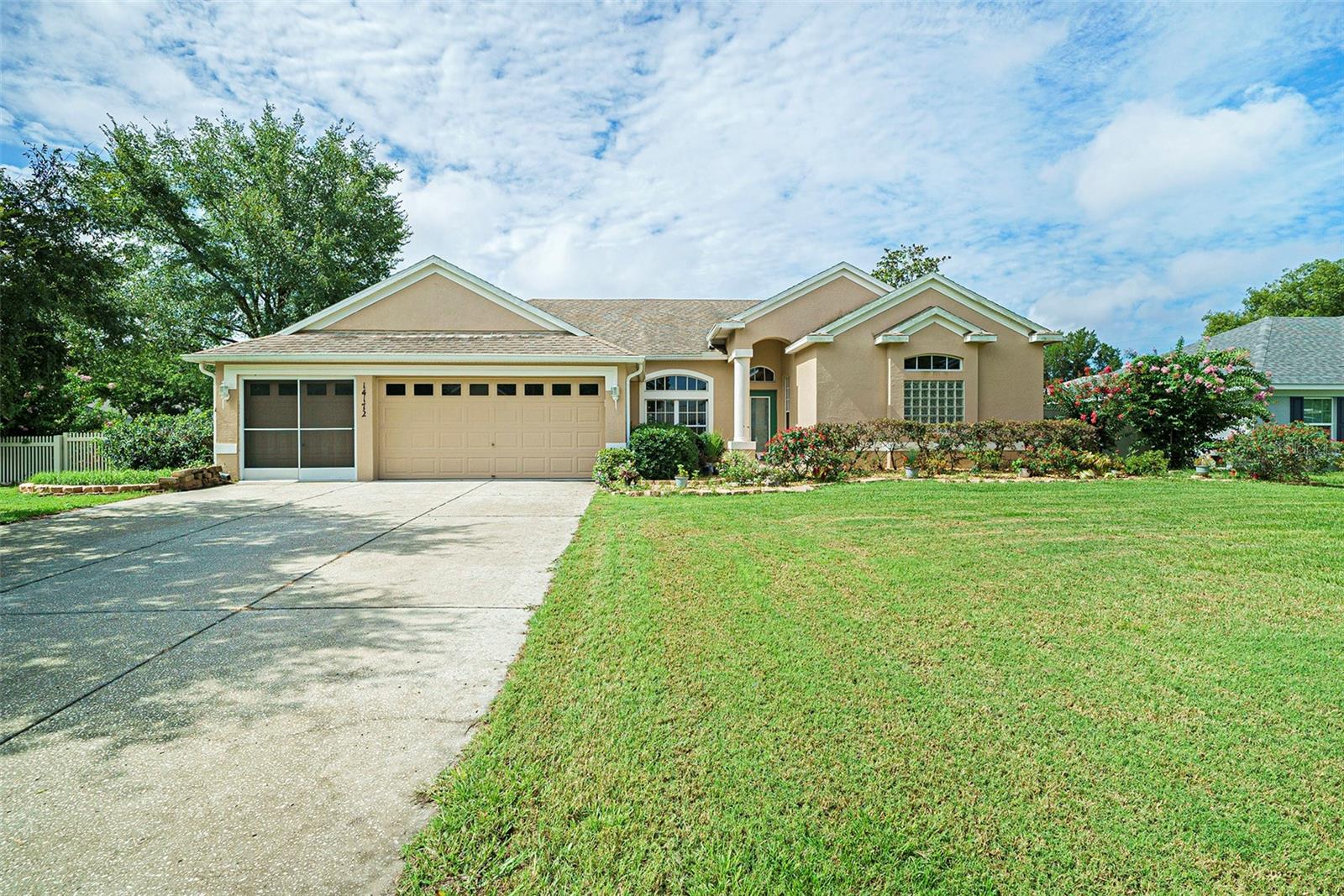Welcome to this beautifully refreshed 4-bedroom plus office, 3-bathroom home nestled on an oversized corner lot in the heart of Spring Hill. Step inside to discover the recently-updated luxury vinyl and porcelain tile flooring and modernized kitchen with beautiful granite countertops that combines style and functionality—perfect for both daily living and entertaining.
The kitchen-living room combination is perfect for family gatherings with sliding glass doors leading right on to the extra-large screened in patio. The fully fenced backyard offers plenty of space for pets, play or even a future pool. Whether you're hosting gatherings, or just relaxing in your private outdoor retreat, this home offers peaceful Florida living year-round. Conveniently located near shopping, dining and local amenities, this gem offers comfort, space and value in a well-established neighborhood.