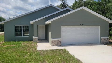 Photo of 24300 SW Sea Cliff Avenue, Dunnellon, FL 34431 (MLS # OM710694)