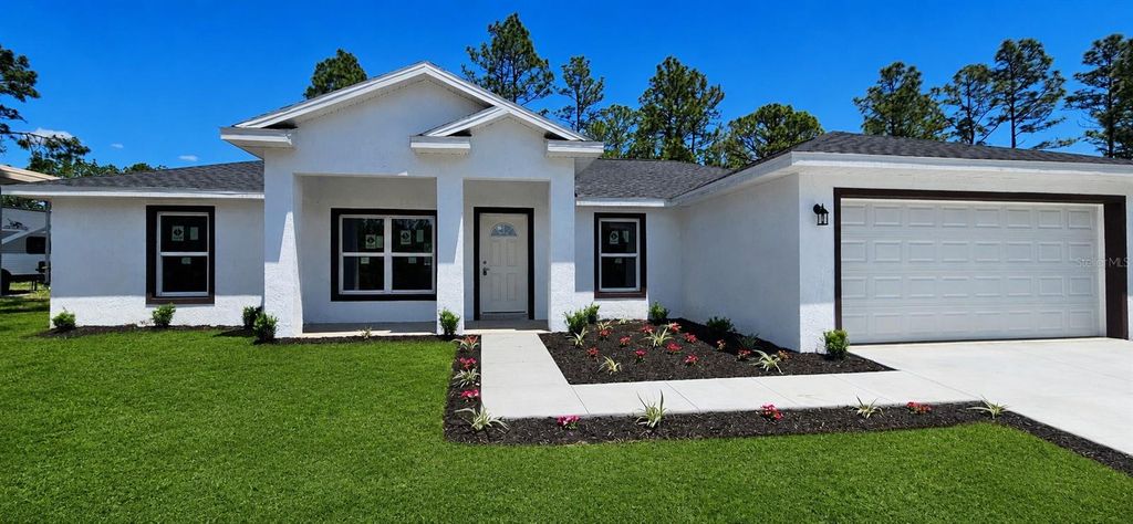 Photo of 1853 W Oliver Drive, Citrus Springs, FL 34434 (MLS # OM724945)