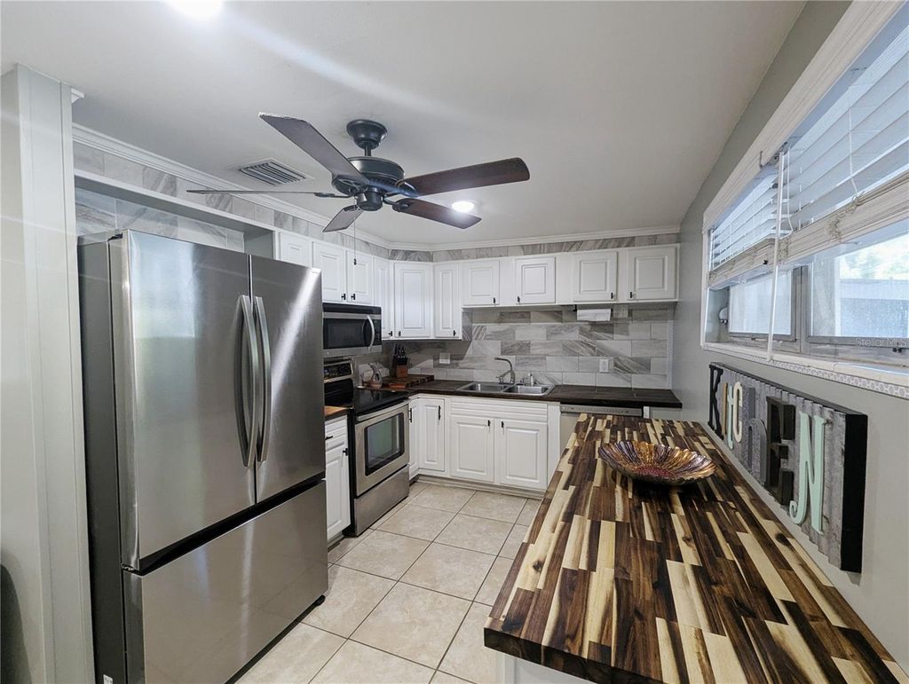 Photo of 97 Risher Avenue, Inglis, FL 34449 (MLS # TB8500286)