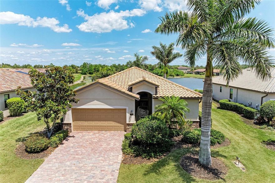 This beautifully refreshed, MOVE-IN READY single-family home in the gated, resort-style community of River Strand Golf & Country Club is ready to impress!  With a SOCIAL MEMBERSHIP to River Strand and Offering over 1,600 square feet of thoughtfully designed living space, the Capri floor plan delivers both comfort and versatility.
The spacious kitchen shines with NEW KITCHEN APPLIANCES, a cozy breakfast nook, and a breakfast bar that flows seamlessly into the dining area—ideal for casual meals or entertaining guests. The open-concept living area overlooks both spaces and leads to sliding glass doors that open to a screened lanai, where you can unwind while taking in peaceful WATER AND LUSH GREEN VIEWS.
The home also features a generously sized laundry room  along with a two-car attached garage for added convenience. Recent updates include fresh interior paint, LUXURY VINYL PLANK FLOORING THROUGHOUT THE MAIN LIVING AREA AND BEDROOMS, and updated ceiling fans and light fixtures, giving the home a clean, modern feel throughout. River Strand is a stunning, amenity-rich community set among beautifully maintained grounds, scenic ponds, and lush landscaping. Residents enjoy a recently completed $9 million renovation of the clubhouse, including an updated grill, RESTAURANT, and inviting outdoor dining spaces.
The community offers an exceptional lifestyle with two main resort-style pools and spas, poolside dining, six additional satellite pools, and two fully equipped fitness centers. Sports enthusiasts will appreciate the tennis and pickleball courts, while a full calendar of social and wellness activities ensures there’s always something to enjoy.
Conveniently located just minutes from I-75 and a growing marketplace filled with shops and dining options, River Strand also offers easy access to the stunning Gulf Coast beaches, making it the perfect blend of luxury, convenience, and Florida living.  All you have been looking for is here, so come and experience River Strand at it's best, you may never want to leave!