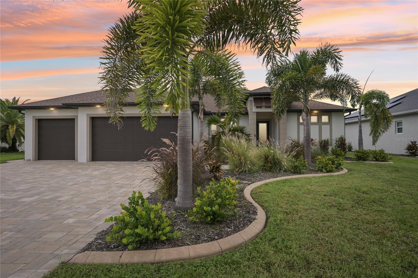 Discover this exceptional custom-built 3-bedroom, 2-bathroom pool home featuring a spacious 3-car garage. Fully furnished as you see it! everything stays! Nestled on a generous 200-foot lot, in the beautiful Rotonda West, Pinehurst area, this residence showcases exquisite design and luxurious finishes throughout. Tired of seeing homes with carpet? You won't find that here, ceramic tile is throughout the home. Step into the chef's dream kitchen, complete with stainless steel appliances and stunning granite countertops, perfect for culinary creations and entertaining guests. Do you see the wine fridge; it was just installed a few months ago ready for your favorite wines to chill at home. Unwind or entertain on your spacious lanai, where you can float in the inviting pool or lounge on the extended paver deck, pure relaxation and bliss await. You and your guests will enjoy ample space to relax by the pool or host gatherings without feeling cramped.
The sweetest dreams will be had in the luxurious owner's suite that features a coffered ceiling, a custom walk-in closet, and a spa-like bathroom equipped with double sinks and a walk-in shower. The split bedroom design ensures privacy and comfort for both you and your guests in the additional bedrooms and bathroom located on the opposite side of the home. Rest easy knowing this home is equipped with impact windows and doors for security and efficiency, all while being located within an X flood zone. Whether this will be your full-time residence or a vacation rental, it's fully ready to go from day one!