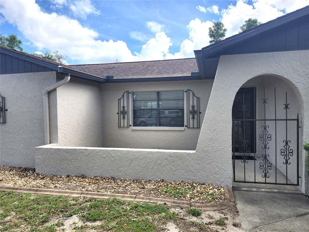 Photo of 2354 Deltona Boulevard, Spring Hill, FL 34606 (MLS # W7887678)