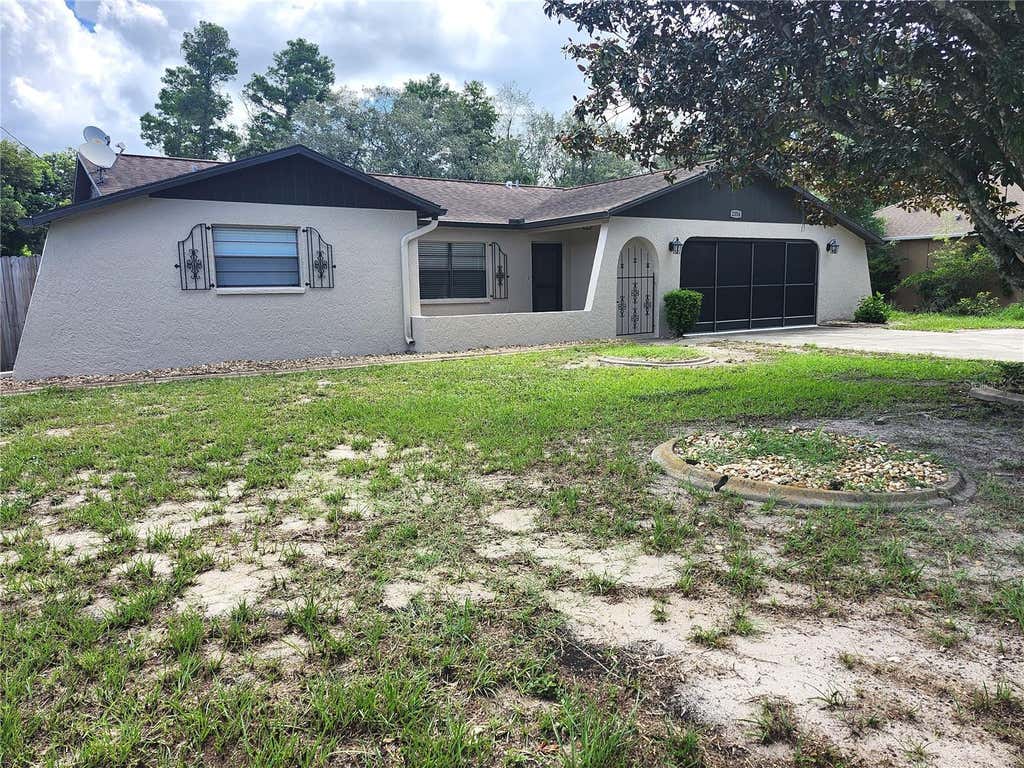 Photo of 2354 Deltona Boulevard, Spring Hill, FL 34606 (MLS # W7887678)