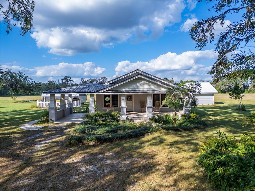 Nestled in the heart of Plant City, a pair of lots at 5020 and 5030 Sydney Road are ready to be yours, offering a sprawling 18.79 acres of pure potential! (See MLS TB8322376) Imagine the possibilities of this serene and versatile property, which not only boasts a charming single-family home and a cozy mobile home, but also a delightful array of pole barns and outbuildings. This tranquil haven is perfect for those seeking a farm, a family compound, or a fresh canvas for a new development venture.
The main residence is a delightful 2-bedroom, 2-bathroom abode, with an estimated 2000 square feet of living space. The home has been  updated with a new roof, modernized bathrooms, and appliances, all wrapped in a warm embrace of rural charm. The spacious home is a testament to the quiet comfort of countryside living, right den to the covered porch for your rocker. The two Properties only sold together. 
Accompanying this dwelling is a 1983 Palm Harbor doublewide mobile home, featuring 3 bedrooms and 2 baths within its 1099 square feet. This additional living space provides ample room for guests or extended family, or hired help ensuring that everyone feels welcome and at home on this expansive property.
The agricultural spirit of the land is reflected in the pole barns, sheds, and out buildings which stand ready to accommodate your RV, boat, and livestock. The existing agricultural well is a nod to the property's fruitful past, which has been farmed with oranges and various crops. The land is zoned for agricultural use, granting you the opportunity to continue the tradition of cultivating. There is also an Agricultural well.
Ancient Oaks with mature pecan, mango, guava, cherry, and banana trees, which not only offer delicious home-grown produce but also add a picturesque quality to the landscape. 
Currently, the land is under an agricultural exemption, which translates to incredibly low property taxes for the new owners. This is a rare opportunity to own a piece of Plant City's rich heritage while also investing in a property that can be tailored to suit your individual needs and dreams. Whether you wish to preserve its natural charm, develop it into a thriving farmstead, or transform it into a new development, this is your opportunity. This is an Estate sale, Sold AS IS.
As you explore the rolling fields and shaded groves, you'll feel the legacy of the land, a legacy that is now being passed onto you. This is more than just a property; it's a piece of the American Dream, waiting for you to write the next chapter. Don't miss out on this exceptional opportunity to make your mark in Plant City! Do not go to property without an appointment.