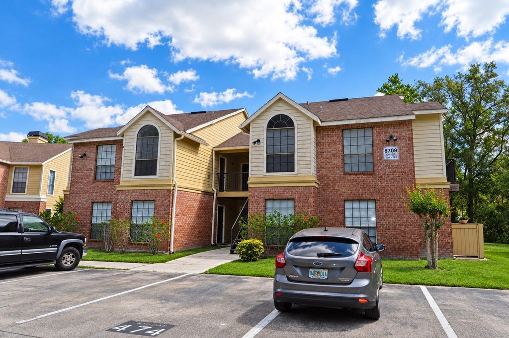 Photo of 8709 Fancy Finch Drive #102, Tampa, FL 33614 (MLS # TB8556205)
