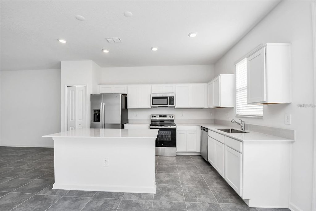 Photo of 121 Bogey Drive, Davenport, FL 33896 (MLS # S5141412)