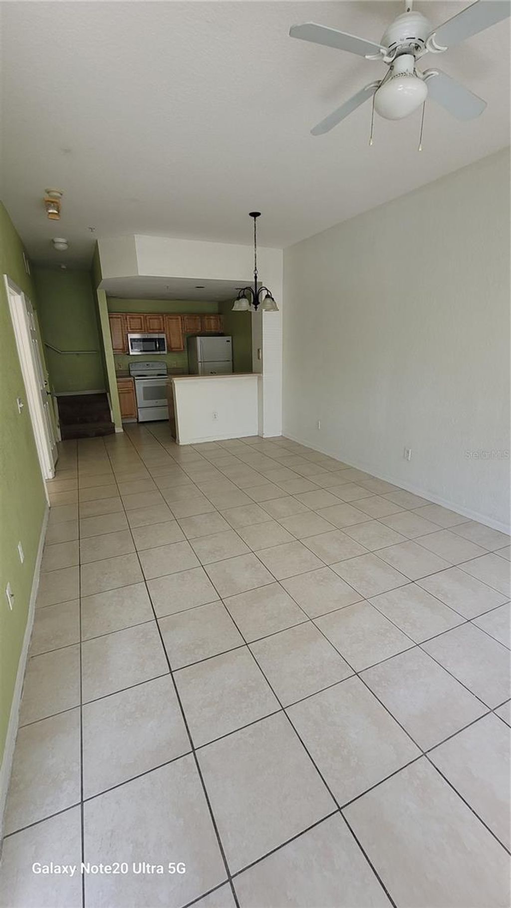 Photo of 4013 Venetian Bay Drive #104, Kissimmee, FL 34741 (MLS # TB8488031)