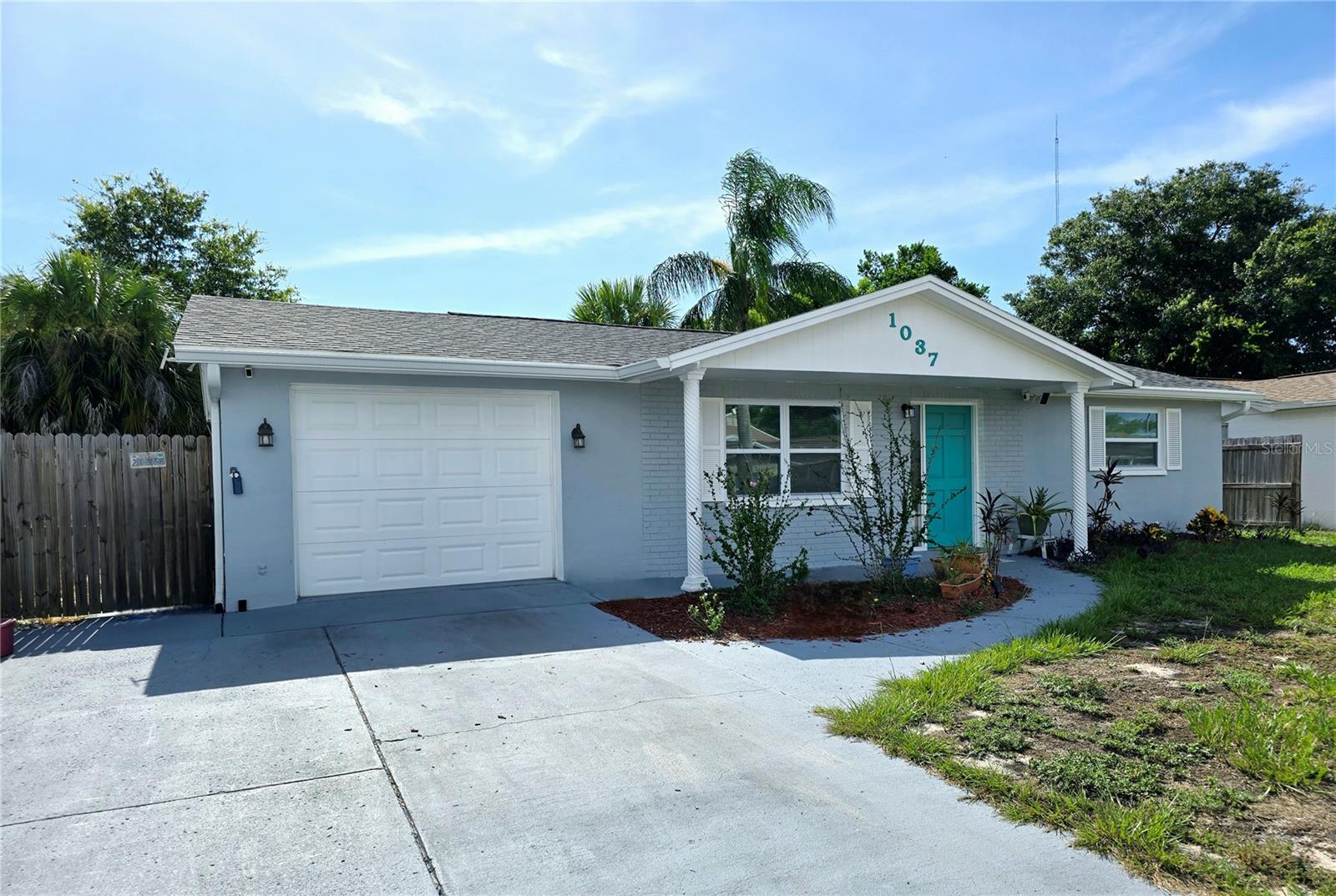 Amazing opportunity! 2-bedroom, 2-bathroom home with a patio/bonus room and a 1-car garage was remodeled in 2022! Upgrades include a new roof, 2022, new AC 2022, new windows, 2022 (excluding patio windows), new electrical panel, 2022, and a new hot water heater 2022. The home features luxury vinyl plank flooring throughout, updated kitchen and bathrooms and stainless steel appliances. Insulation has been added to the attic, and the exterior offers a privacy fence. This home is conveniently located near beaches, hospitals, shopping, parks, the famous Tarpon Springs Sponge Docks, waterside dining, entertainment, and more. Just 28 miles from Tampa Airport.