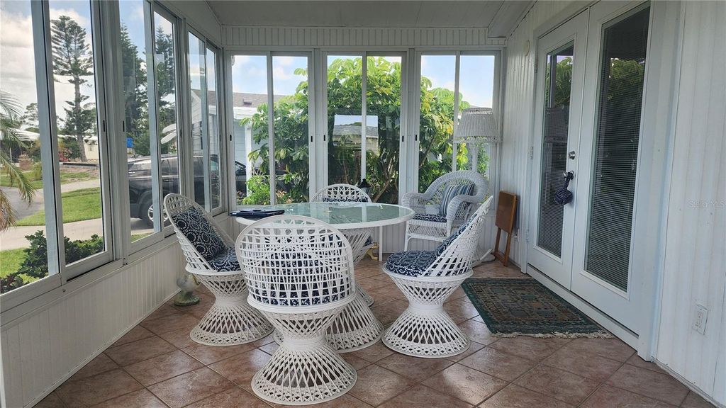 Photo of 10 S Botany Bay Circle, Englewood, FL 34223 (MLS # A4660922)