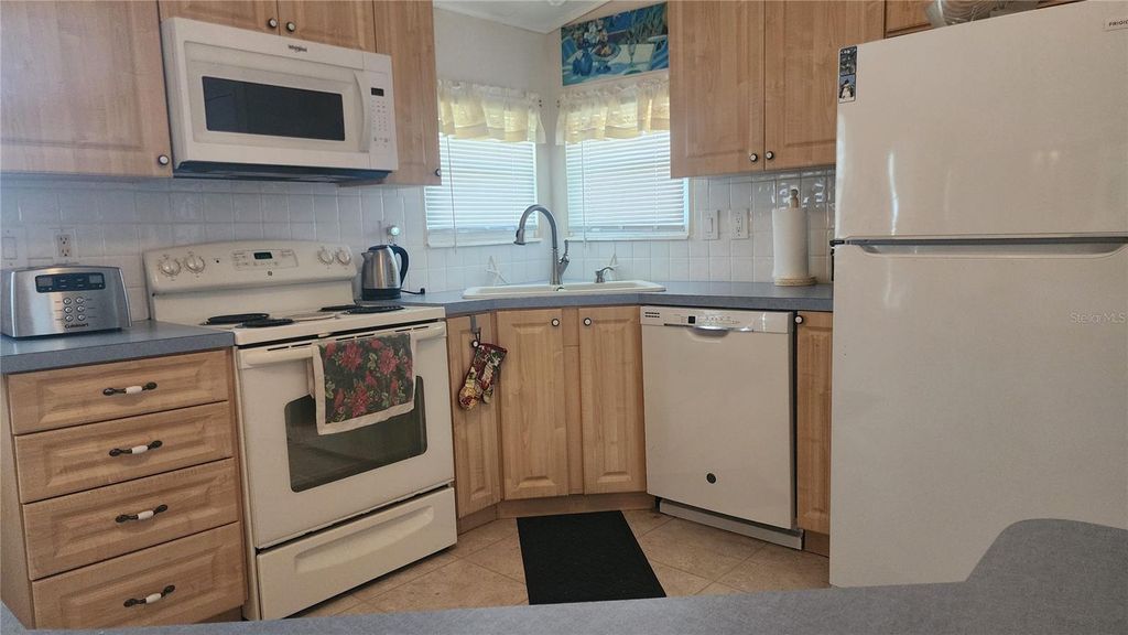 Photo of 10 S Botany Bay Circle, Englewood, FL 34223 (MLS # A4660922)